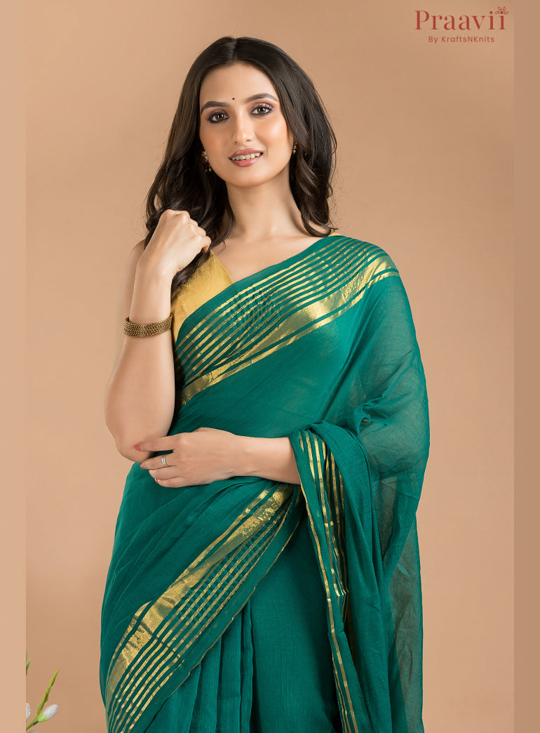 Bottle green Mulmul Cotton Saree with gold striped border
